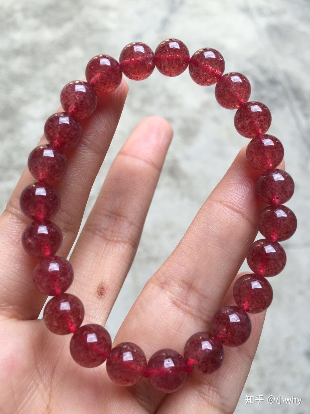 这个鸽血红的草莓晶是真的假的大概值多少钱