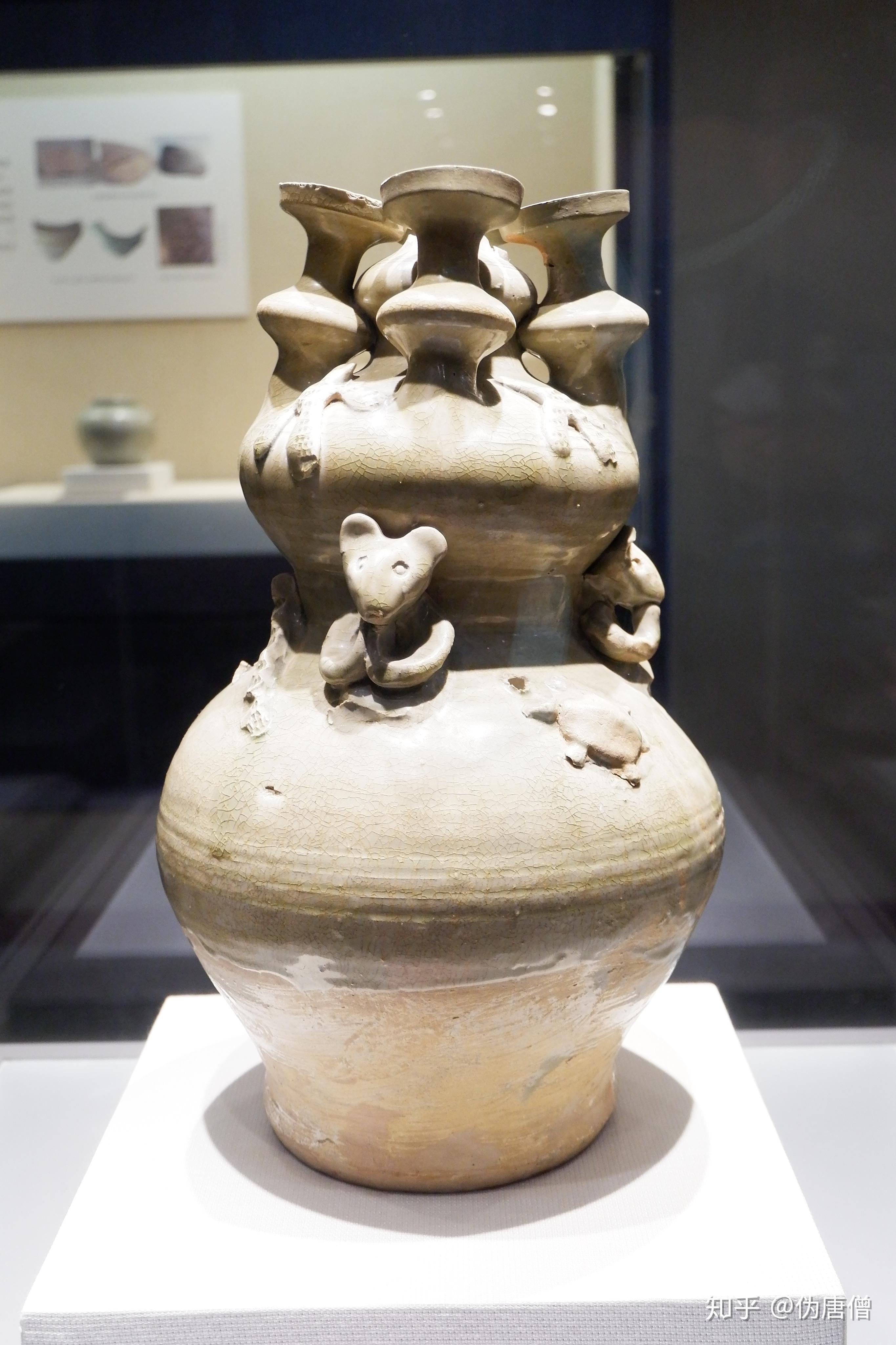 博物馆里的瓷器史5西晋青釉堆塑楼阁飞鸟人物罐上海博物馆藏