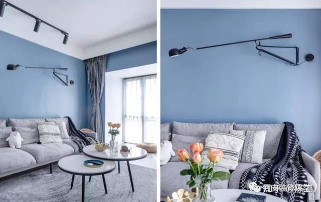与蓝色对比,让空间更清新,更有层次感;电视墙角落吊灯以及绿植的搭配
